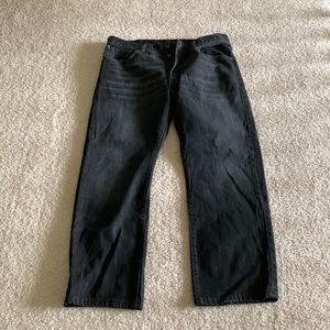 Levi’s 501 button fly in washed black w whiskered wash detail. 36 30